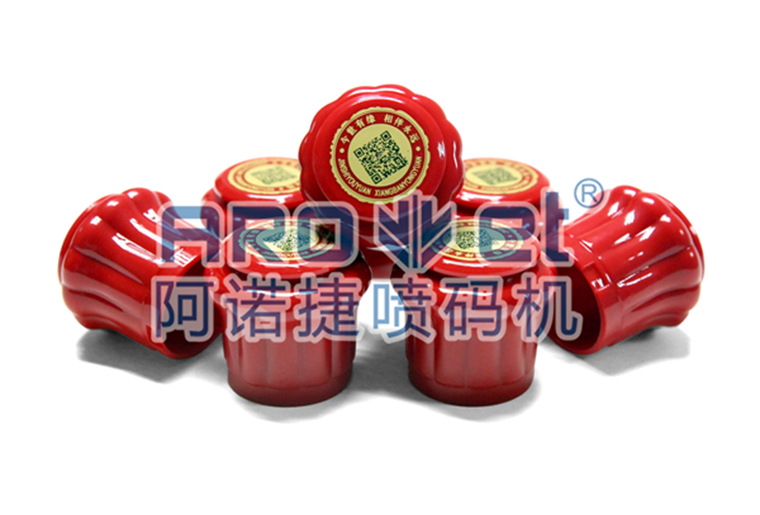 CA88瓶盖喷码机在瓶盖上喷印二维码